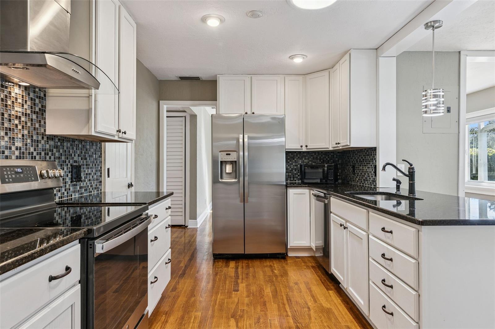 Totally remodeled kitchen with soft close cabinets and stainless steel appliances