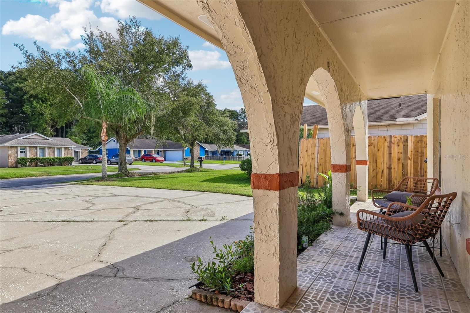 You'll enjoy sitting on your covered patio with beautiful tile accents