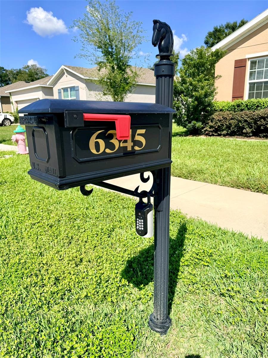 Lockbox on mailbox rail