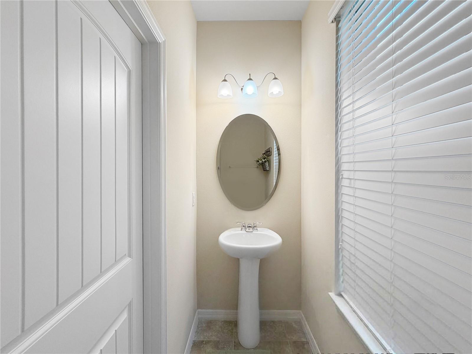 Powder room located downstairs