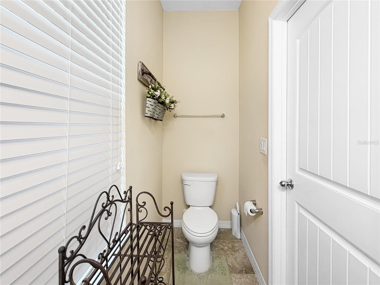 Powder room located downstairs