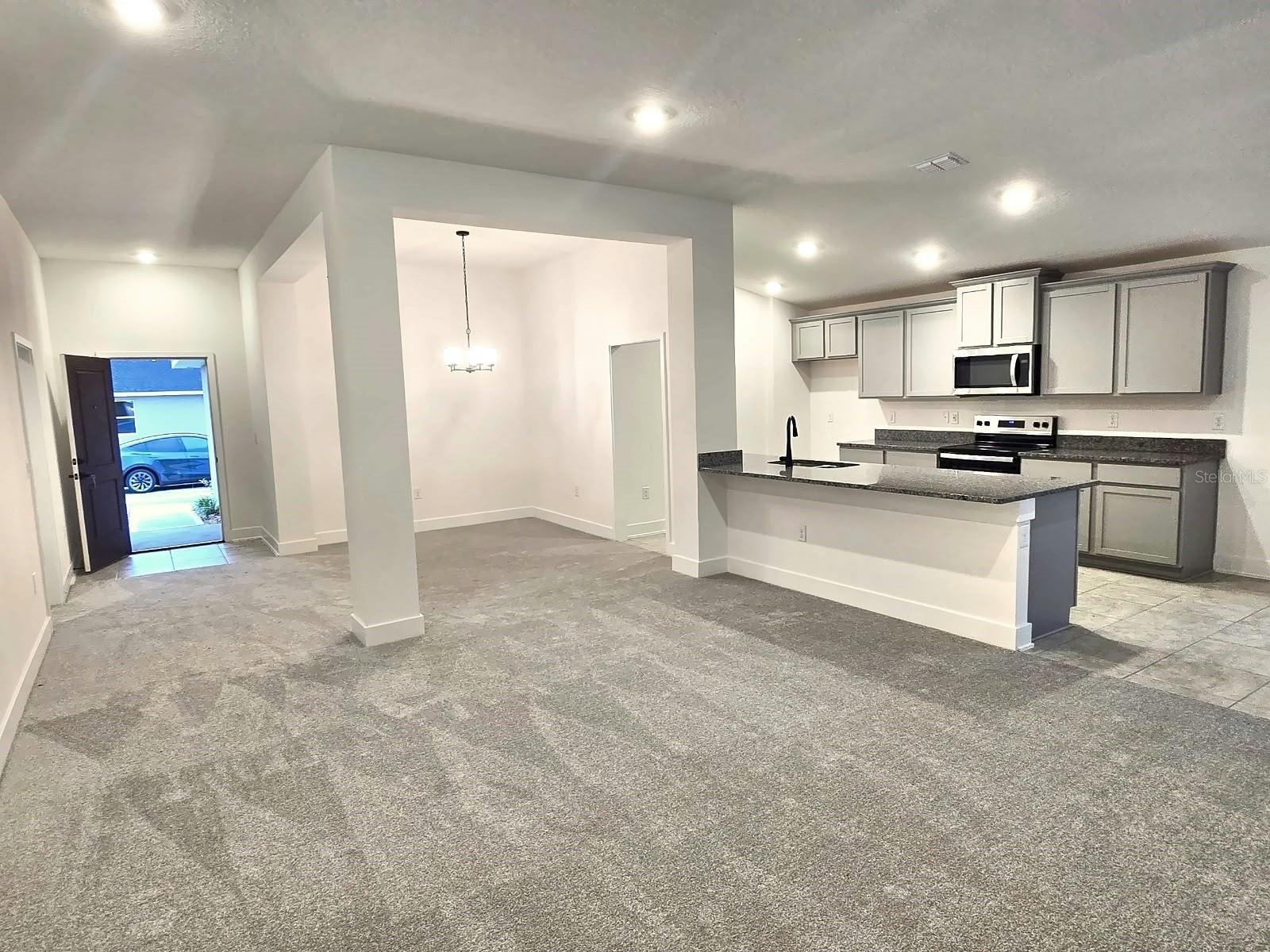 Great room, dining room and kitchen