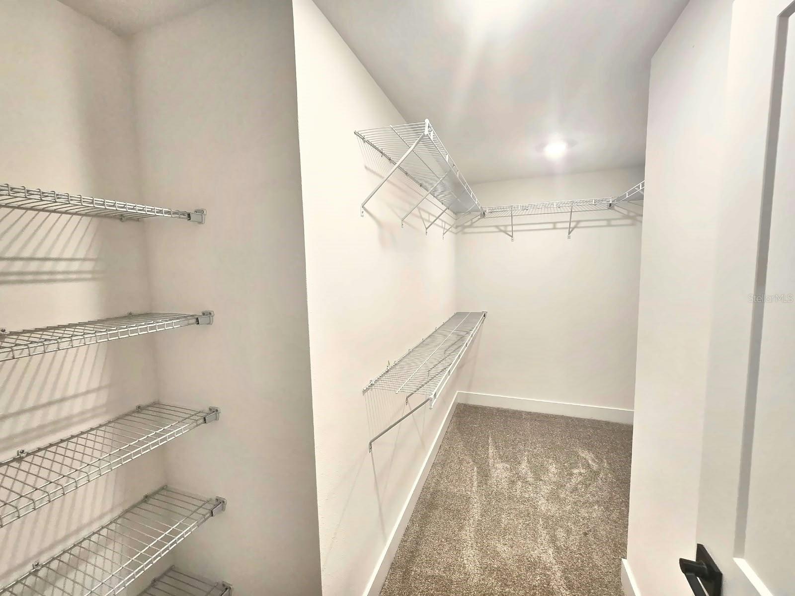 Primary walk-in closet