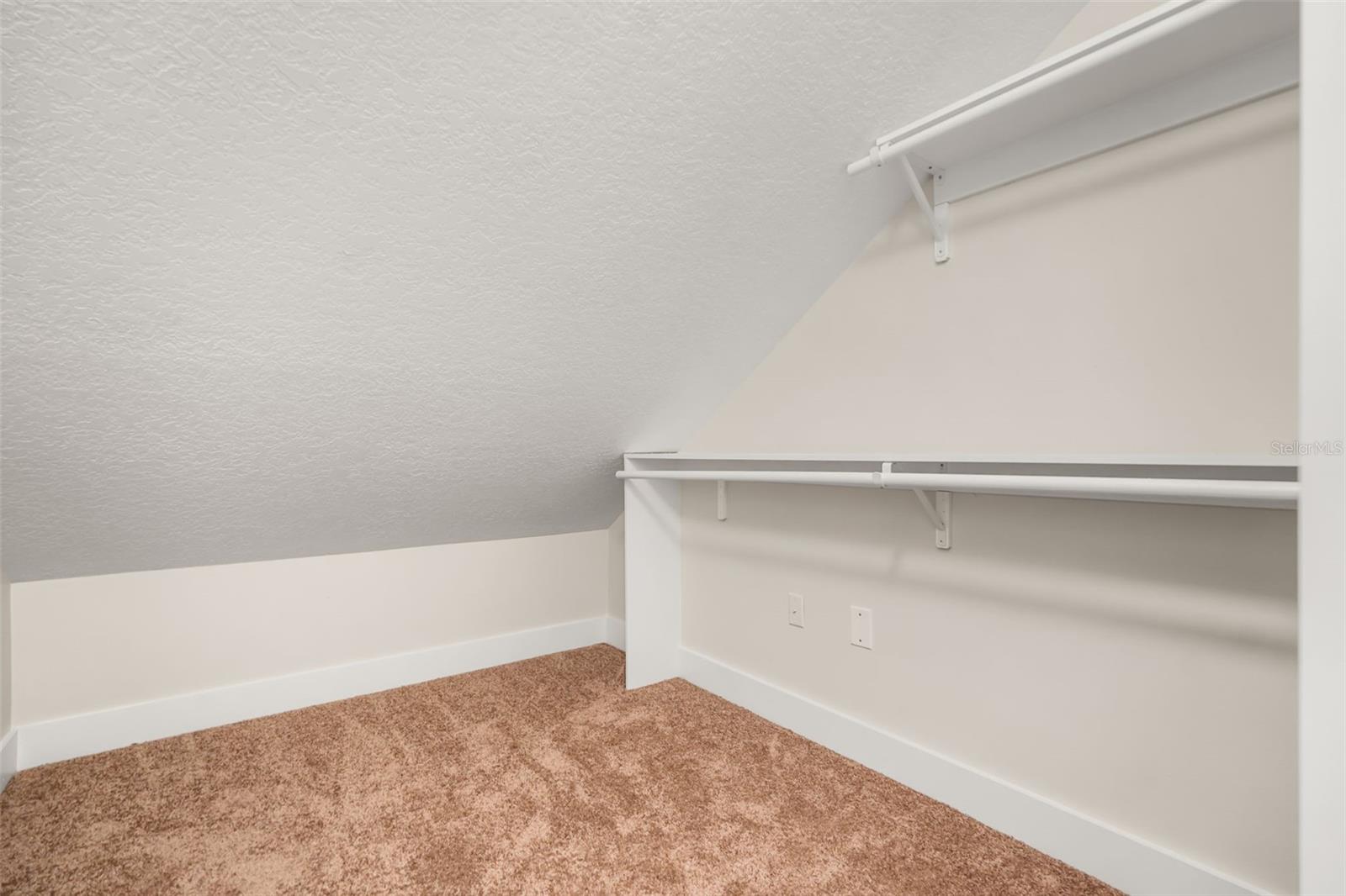 Upstairs guest bedroom closet
