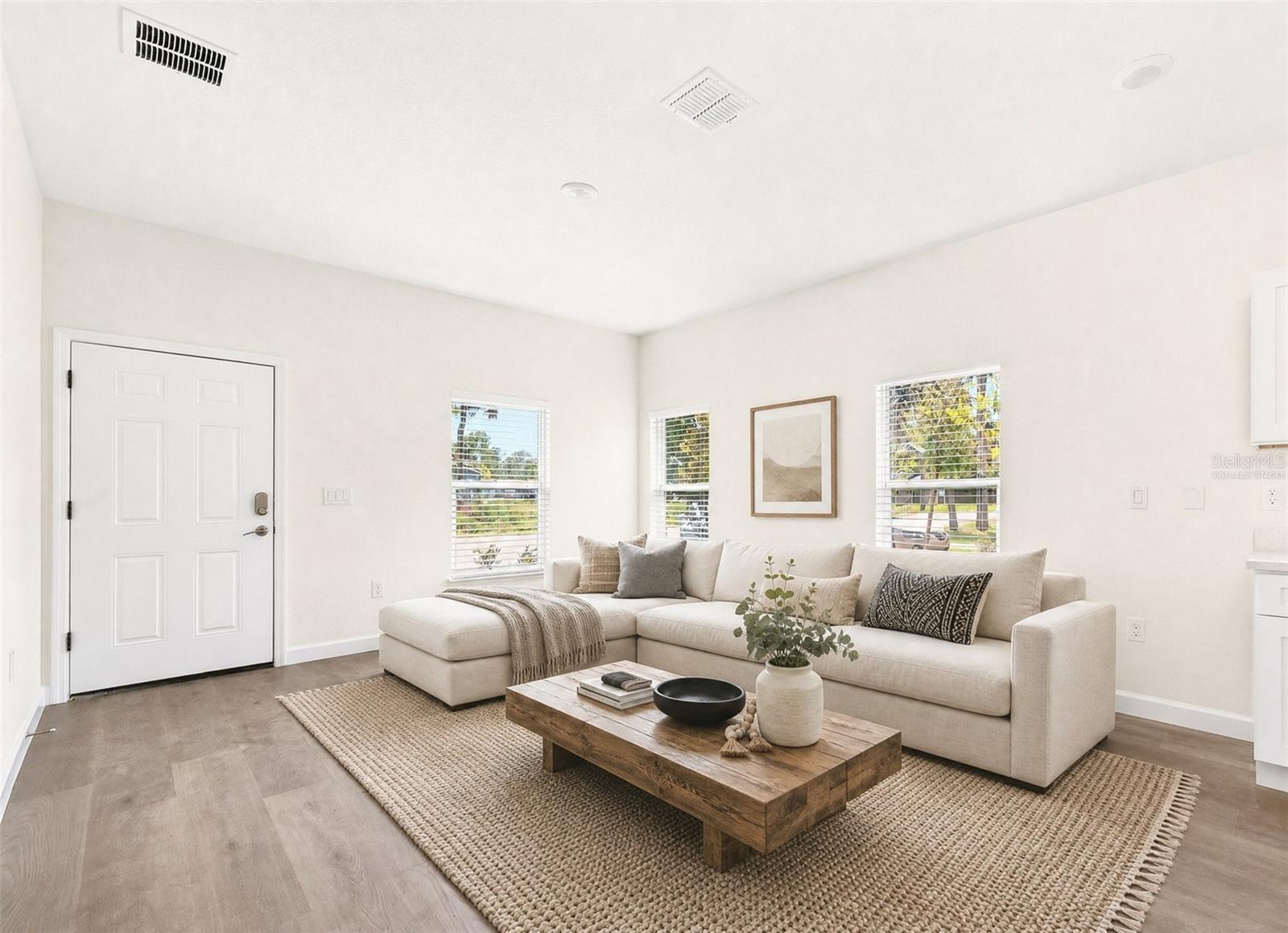 Light, bright open concept living. Virtually Staged.