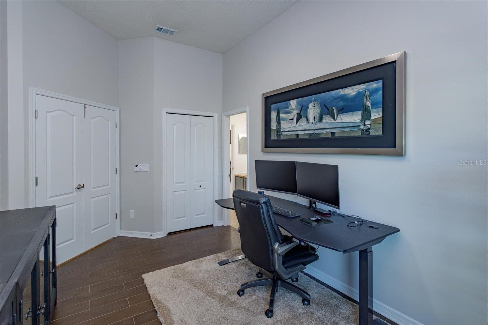 Bedroom 4 with double doors is a great office or bedroom with attached bathroom