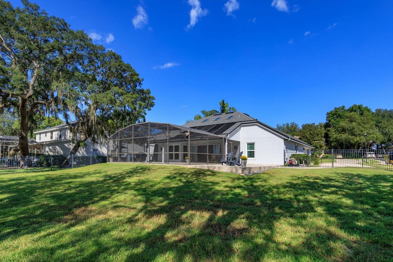 Lot size is 105' x 150' with aluminum fenced backyard