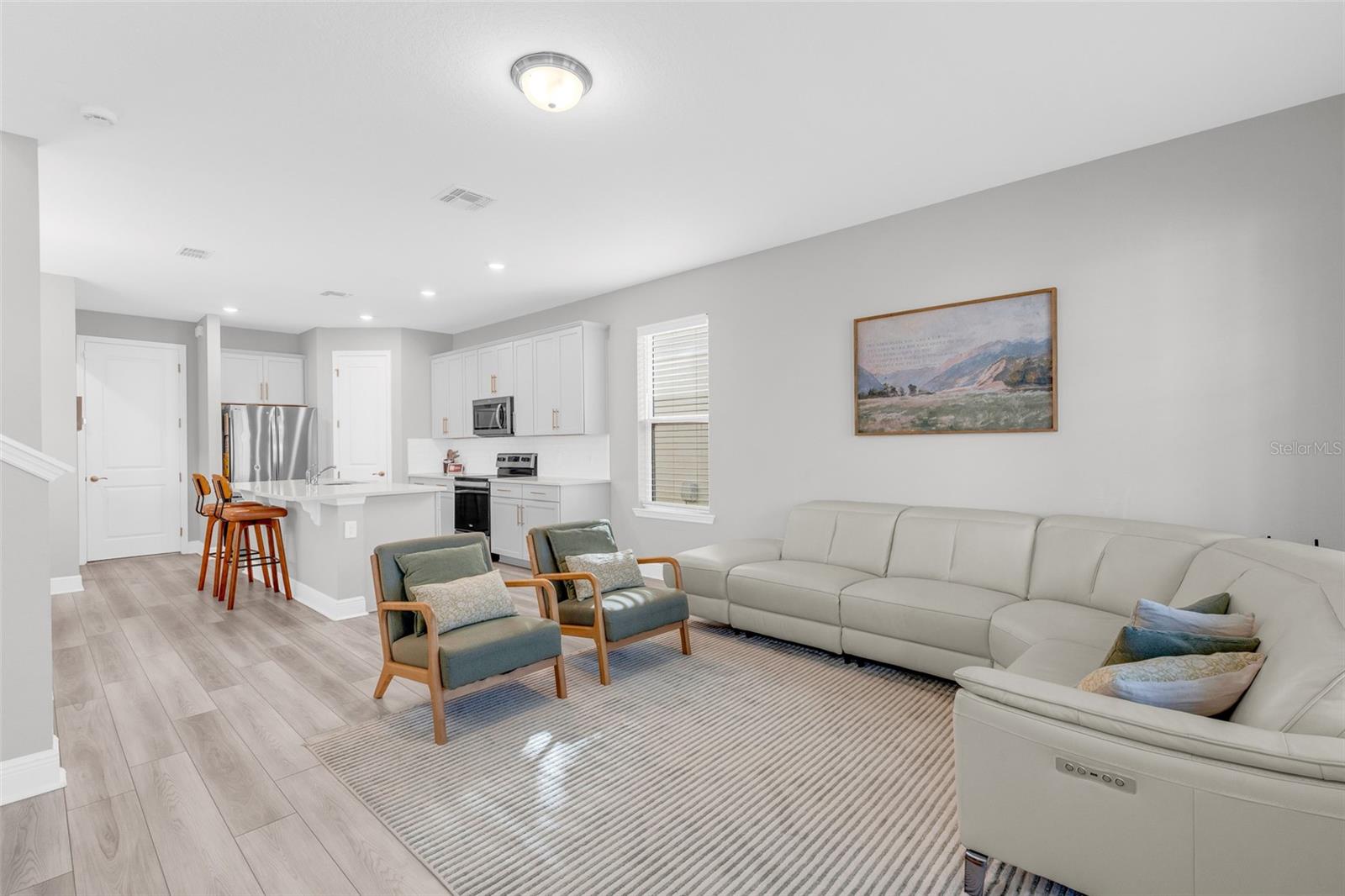 Living room with an open layout and natural light