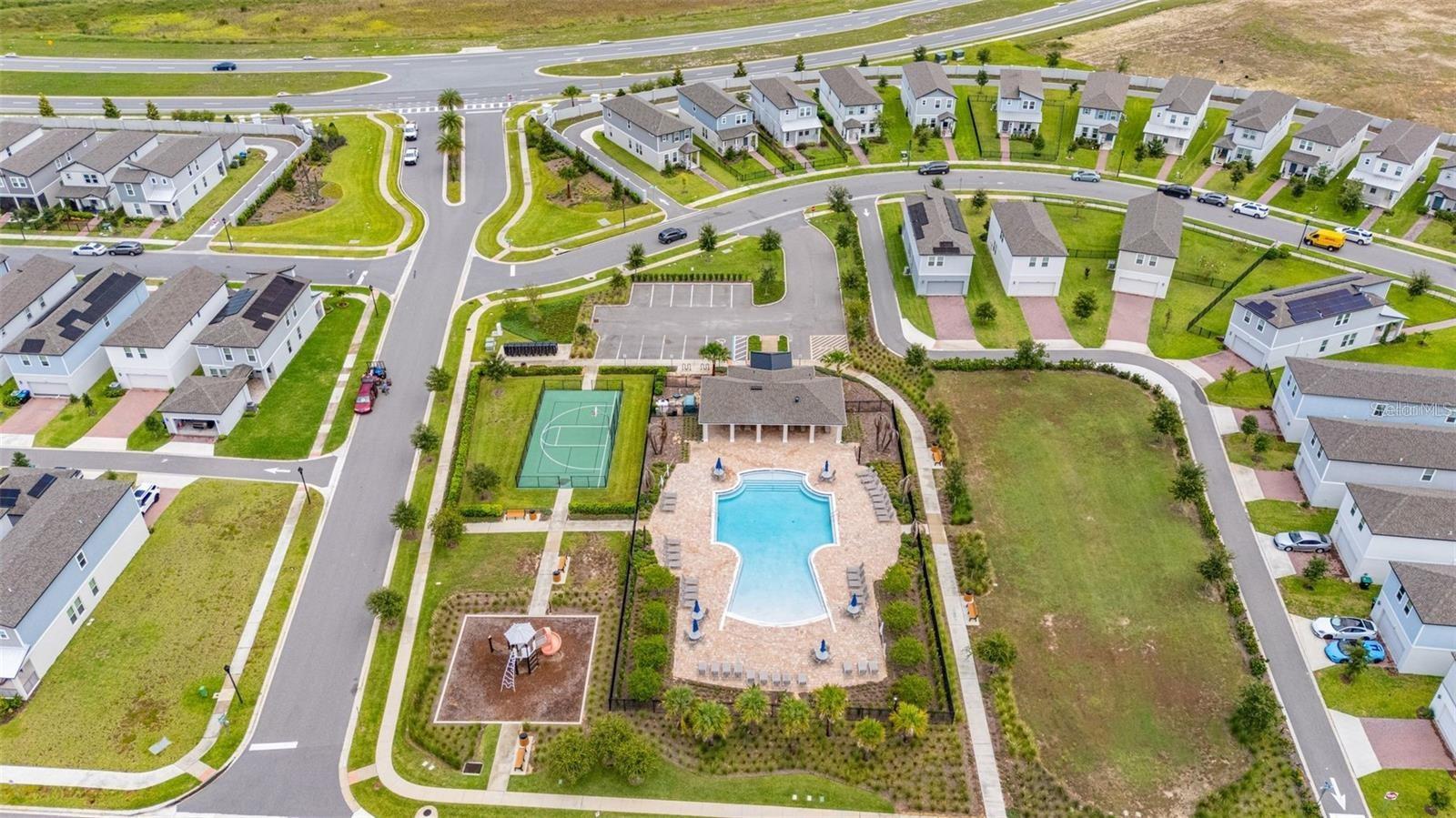 Community amenities surrounded by neighborhood homes