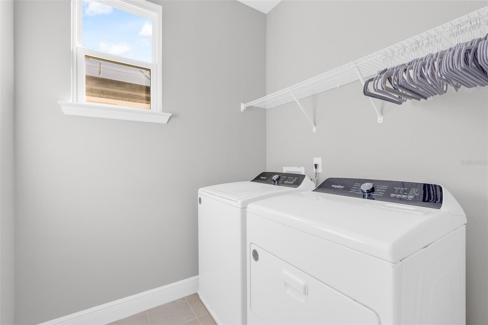 Laundry room with washer and dryer