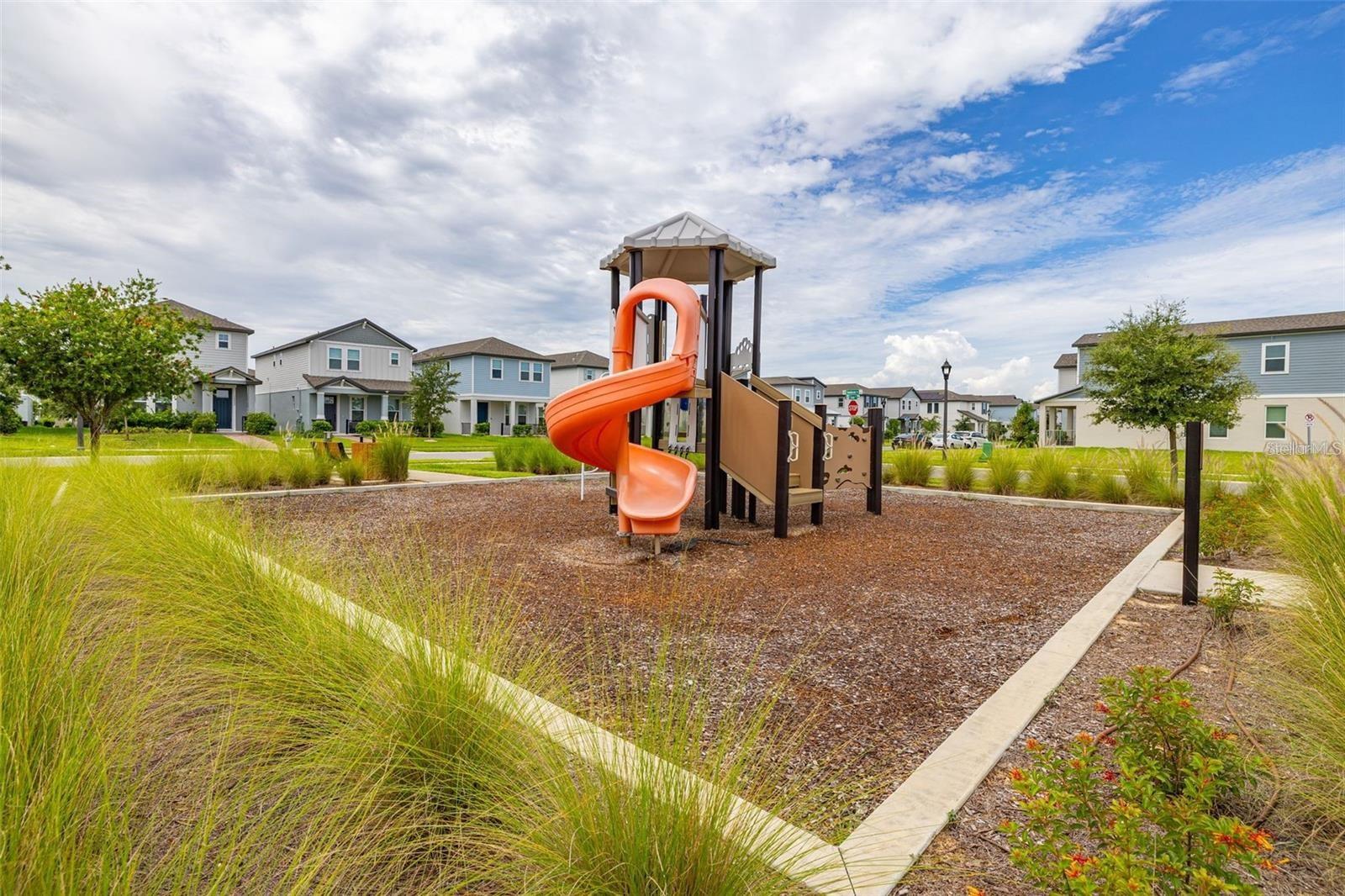 Community playground with slides and climbing features.