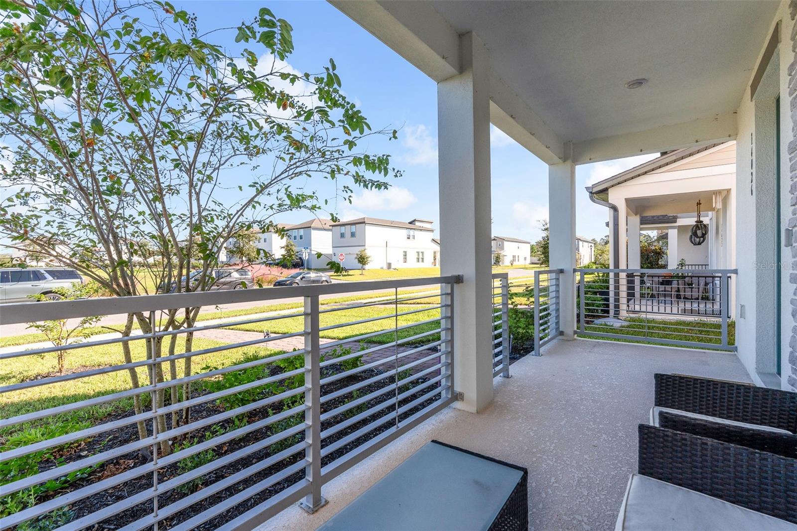 Covered front porch overlooking the neighborhood