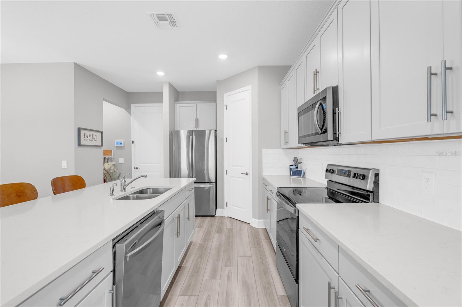 Kitchen with generous counter space and cabinet storage