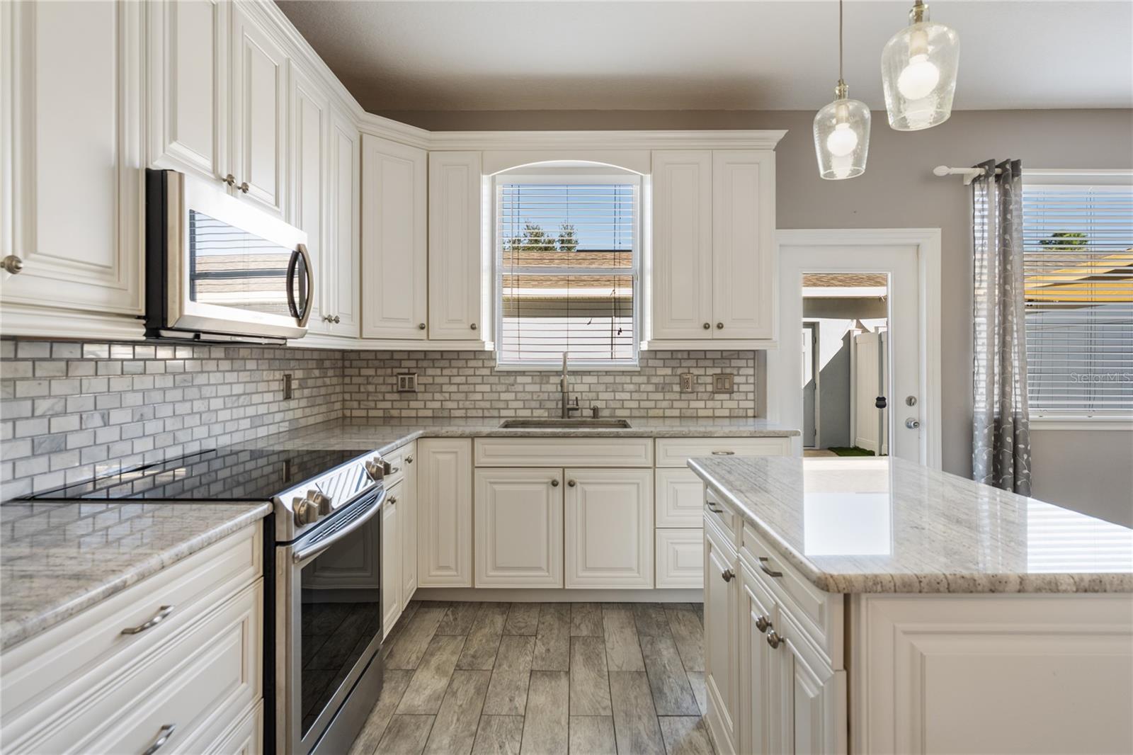 Kitchen with stainless steel appliances included!