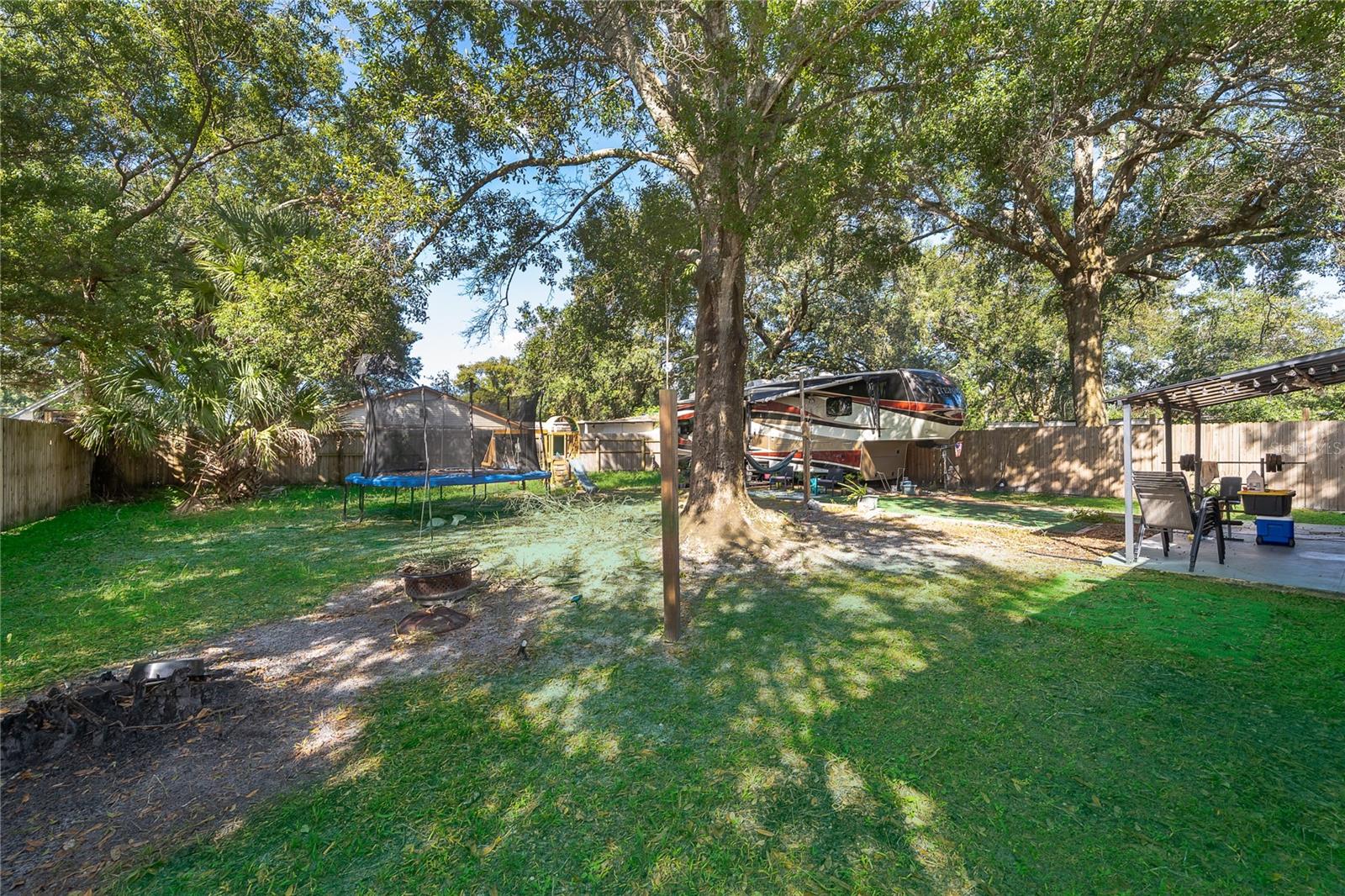 Imagine weekend gatherings, outdoor activities, or simply relaxing beneath the shade of the beautiful mature trees.