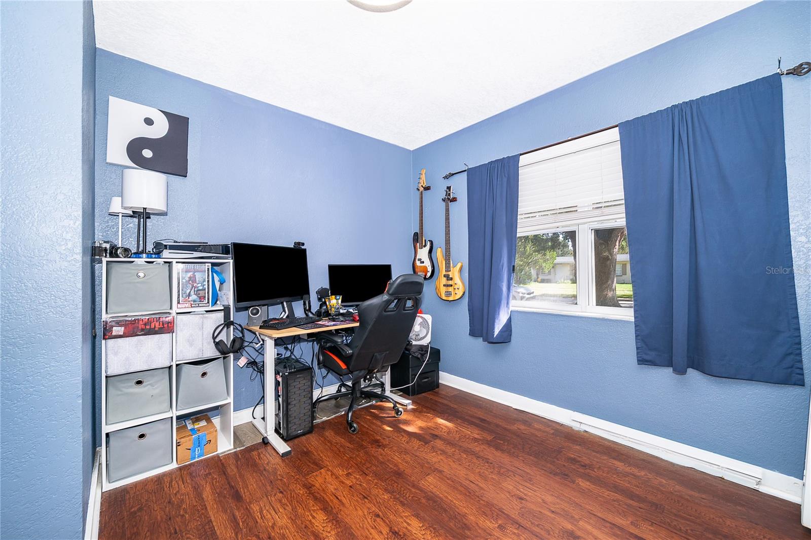 Need a dedicated workspace? This versatile room offers a great setup for a home office, study, or creative space.