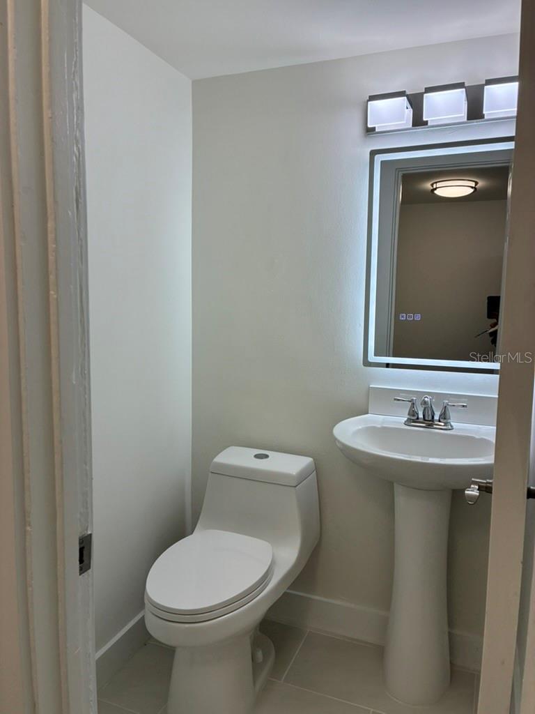 Half-bath at unit entry