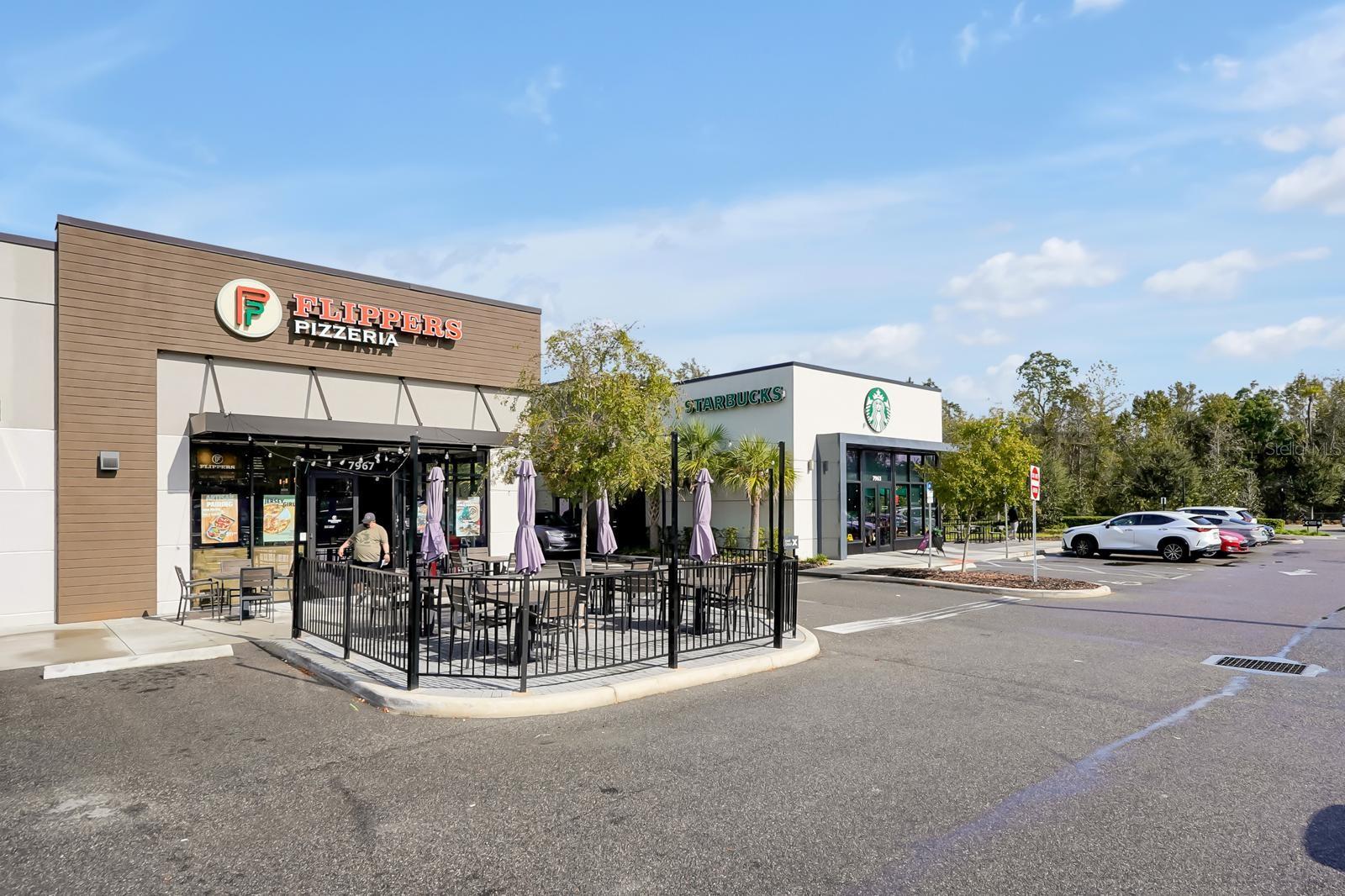 SHOPPING AT ENTRANCE OF COMMUNITY