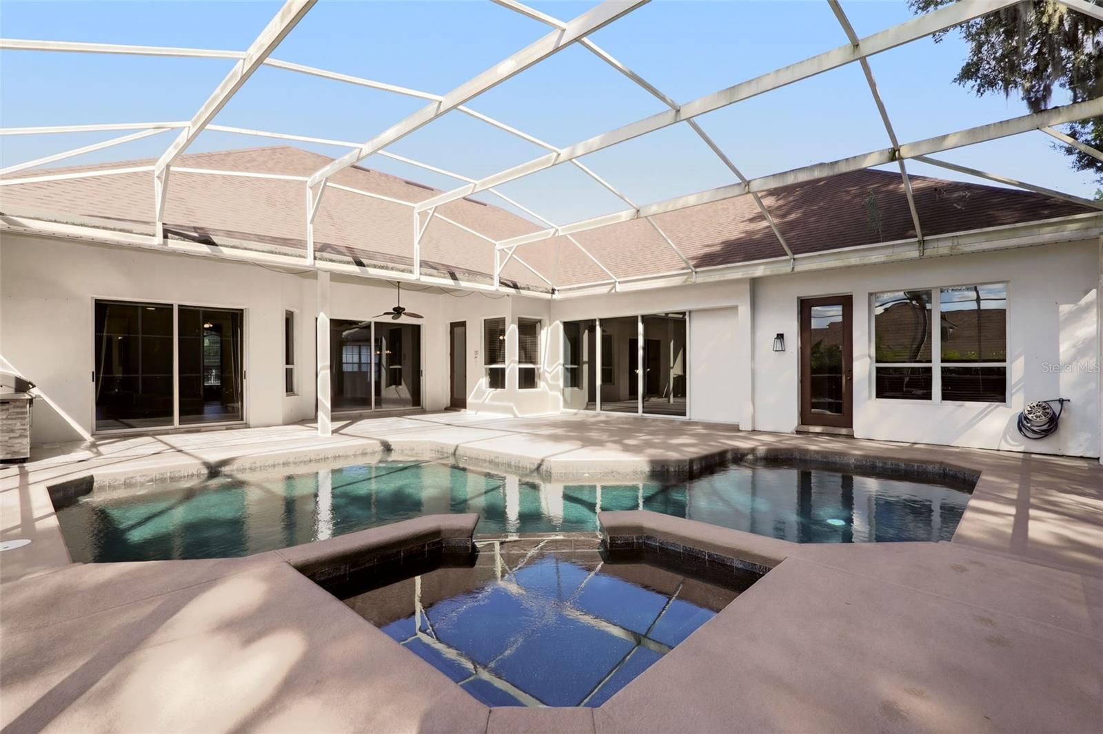 Pool with Sliding Glass Doors around