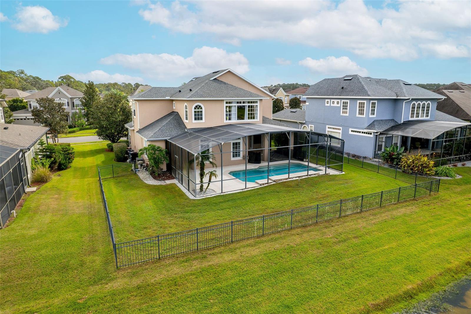 Large fenced yard on the water