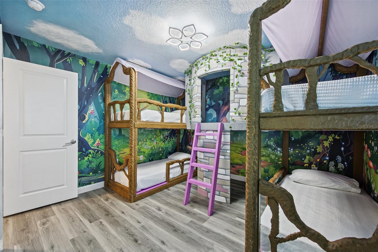 Forest-themed bunk room