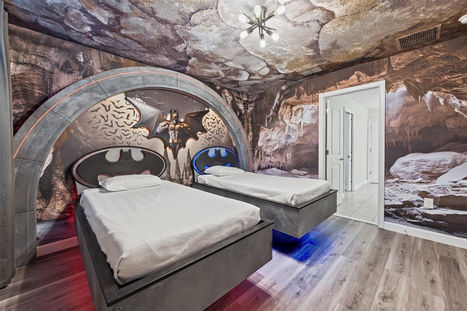 Superhero-themed twin bedroom