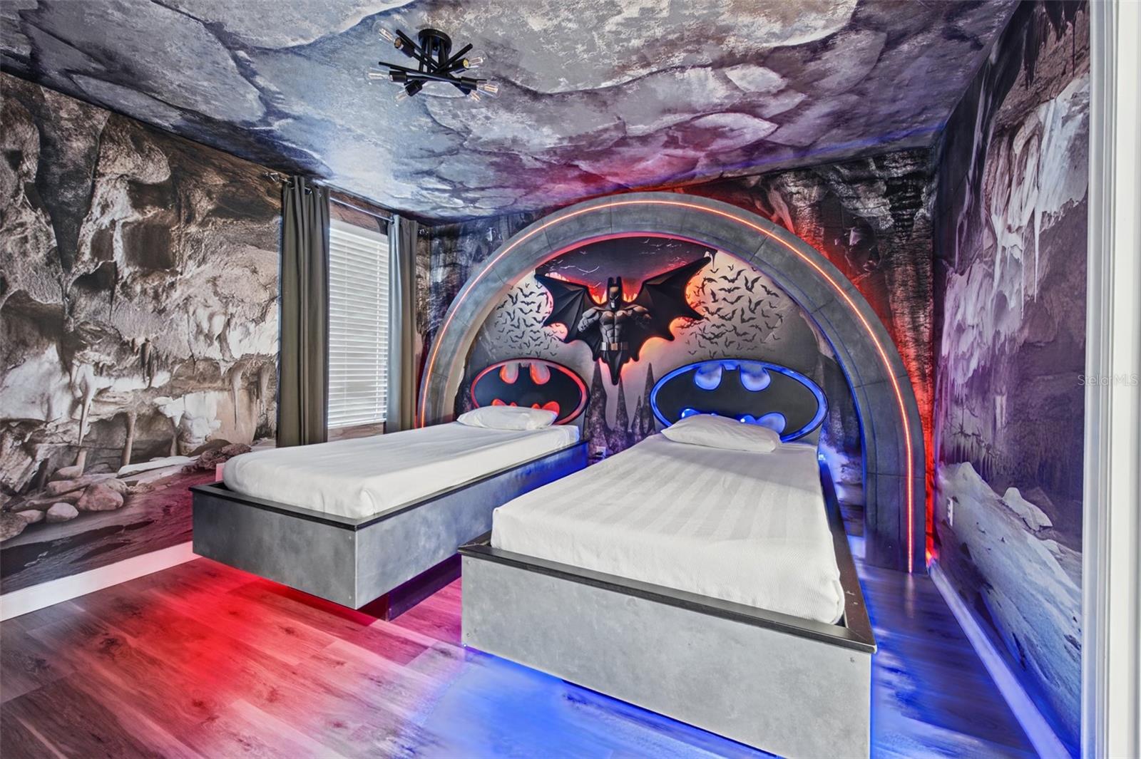 Superhero-themed twin bedroom