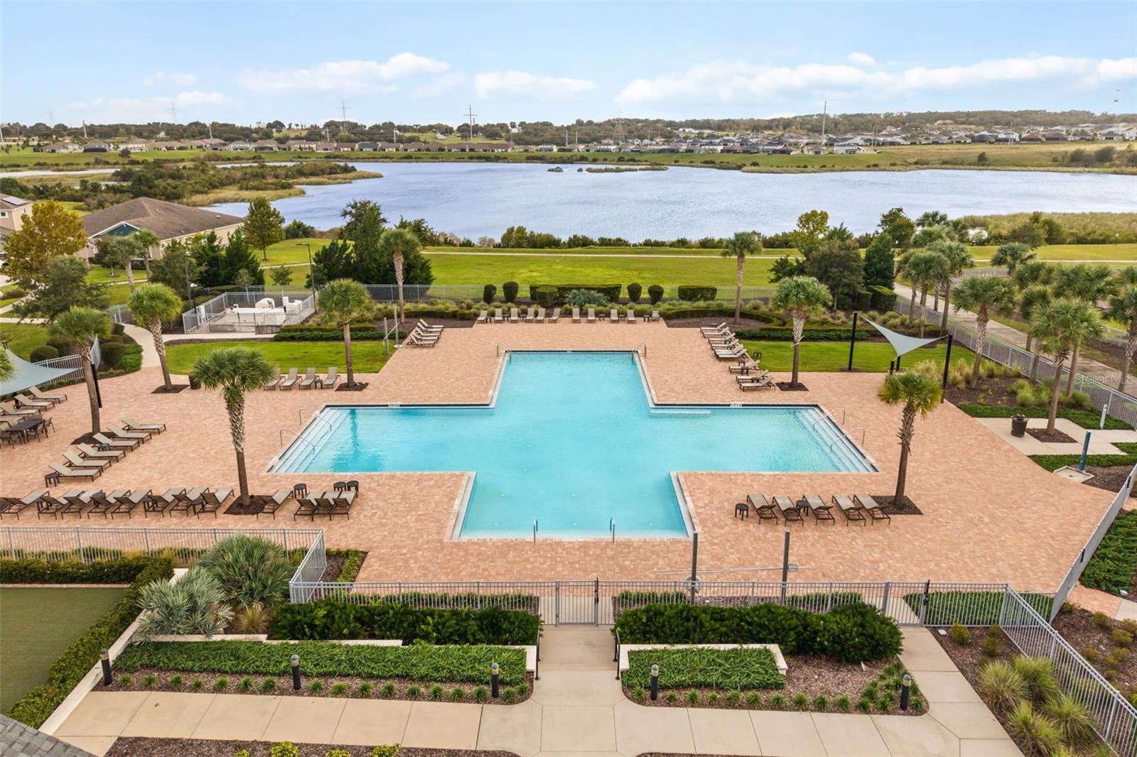 Community pool, clubhouse, fitness center and lake