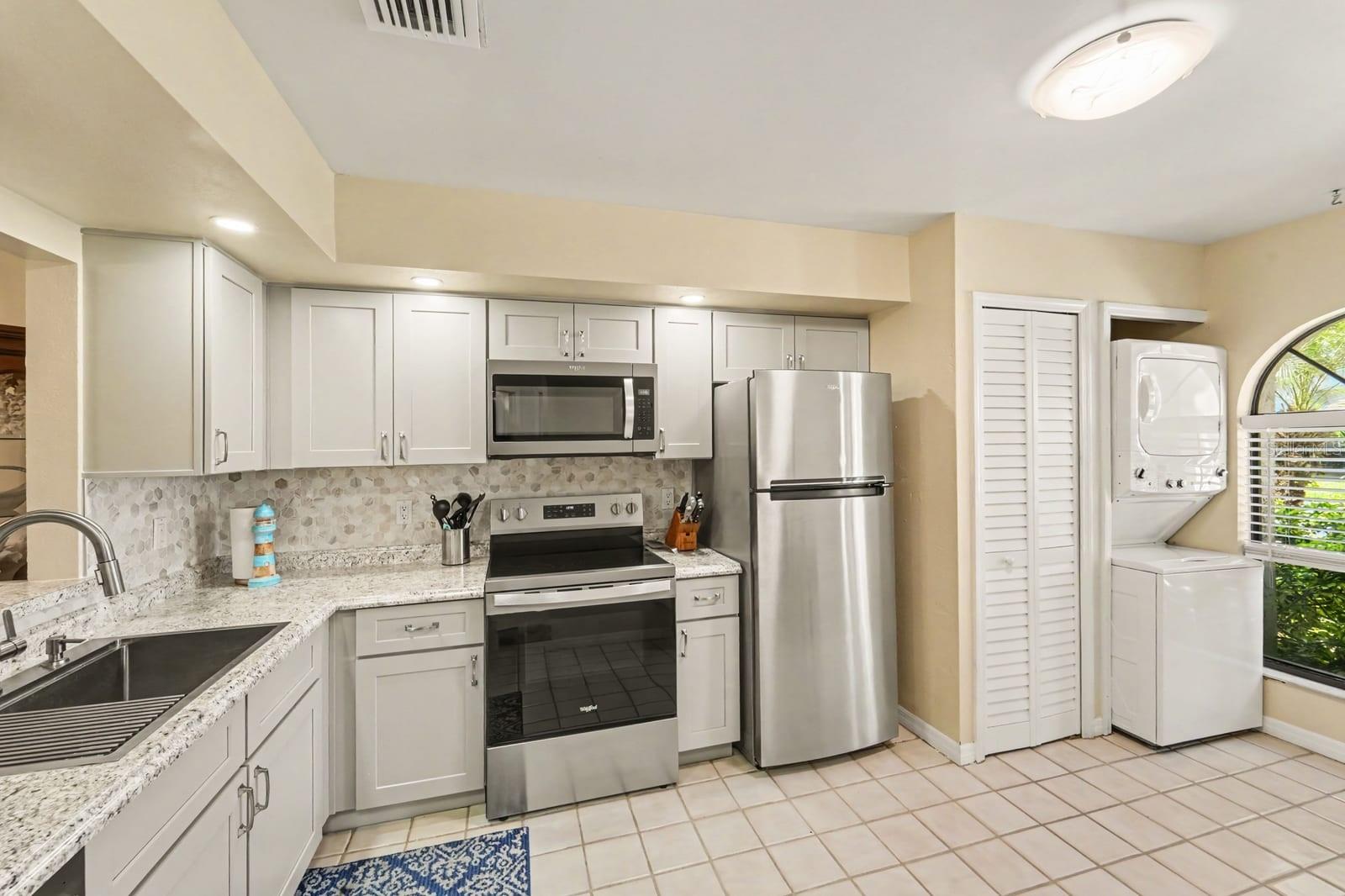 Updated Kitchen with Stainless Appliances and Bright Layout Updated Kitchen with Stainless Appliances and Bright Layout