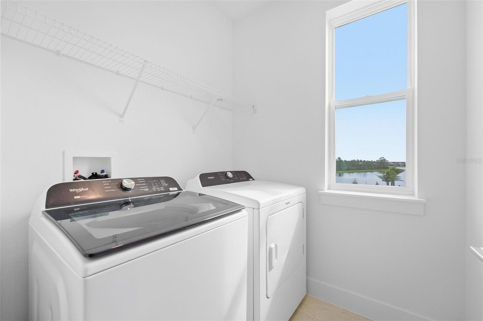 Laundry room with washer and dryer included
