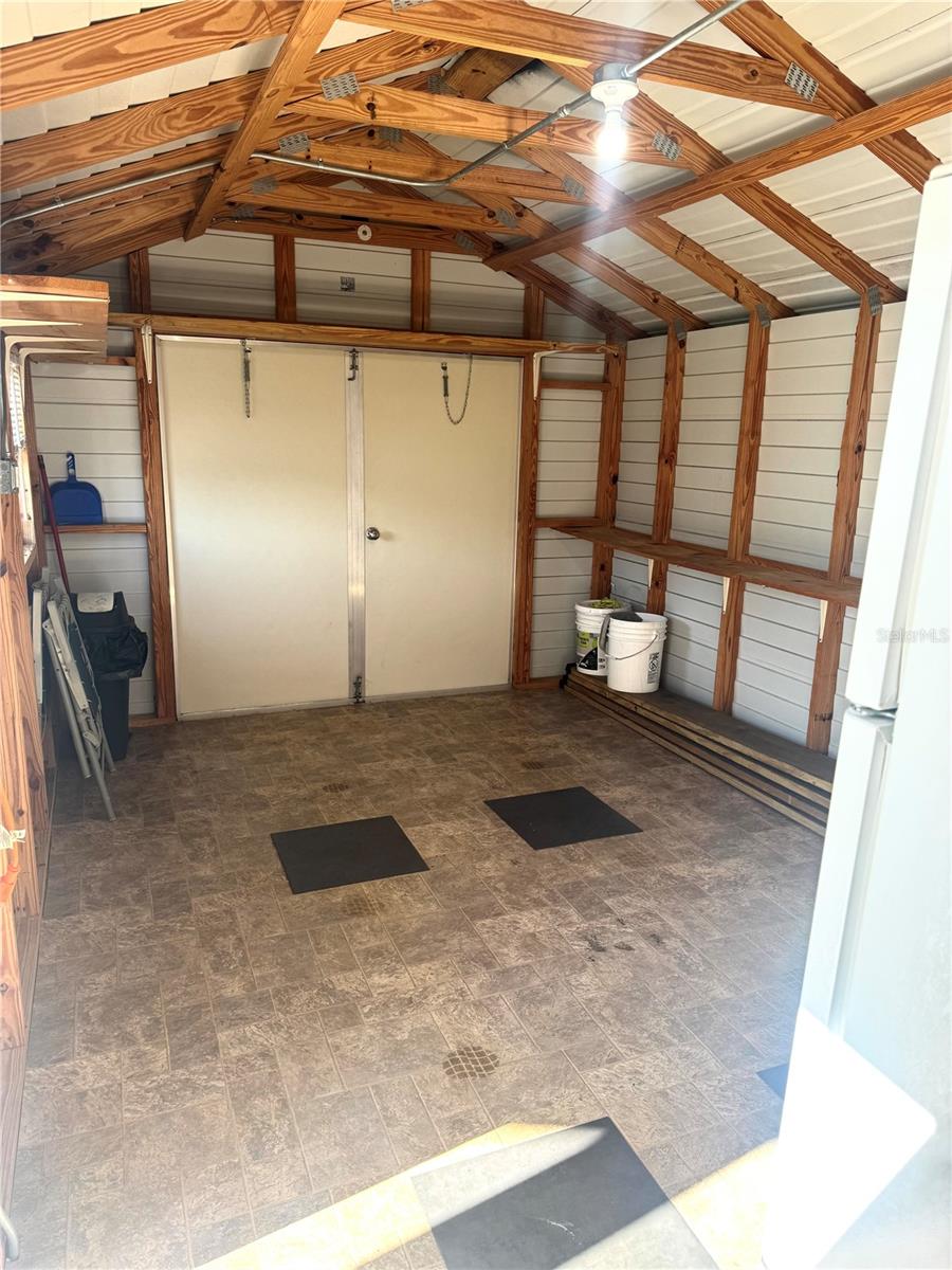 Inside shed with large doors
