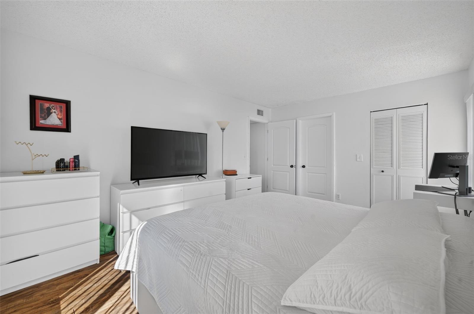 Primary bedroom with ensuite bathroom
