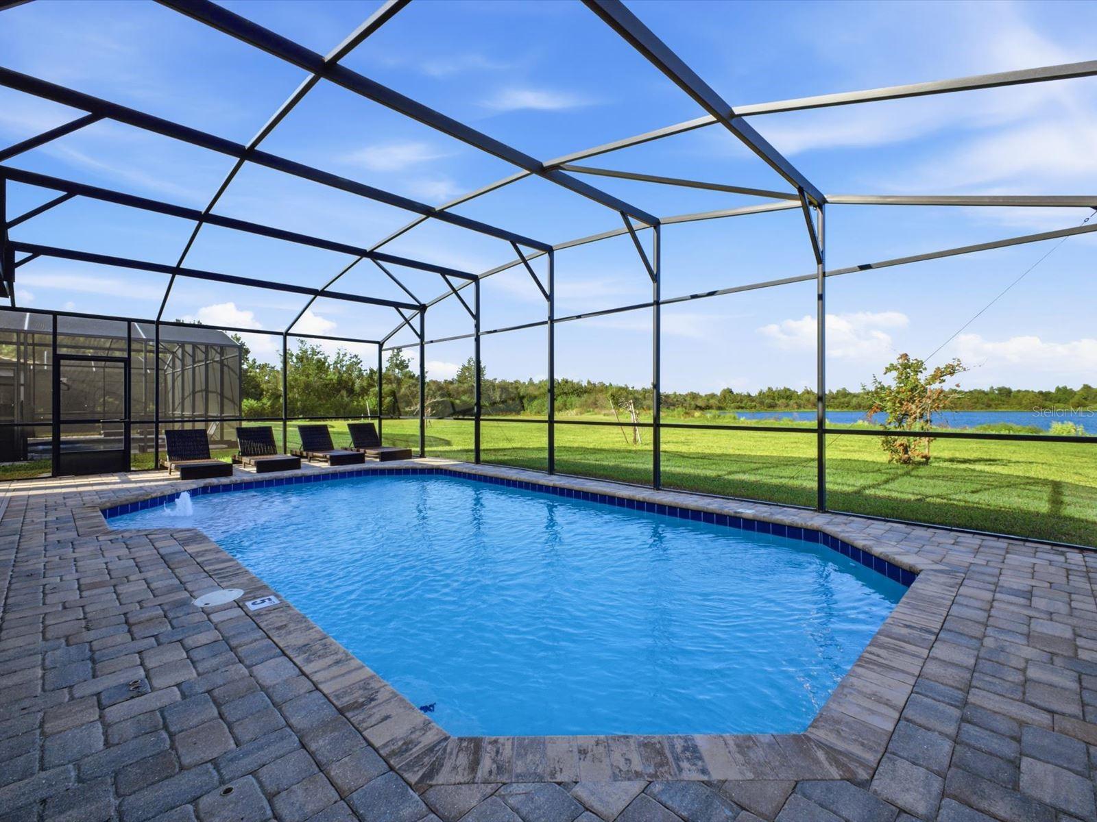 Screened in west facing pool with water view Screened in west facing pool with water view