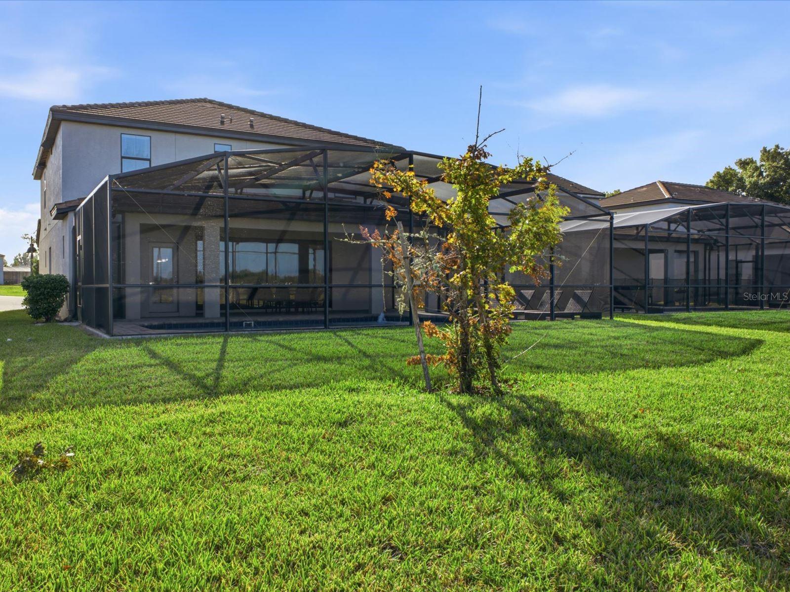 Screened in west facing pool with water view