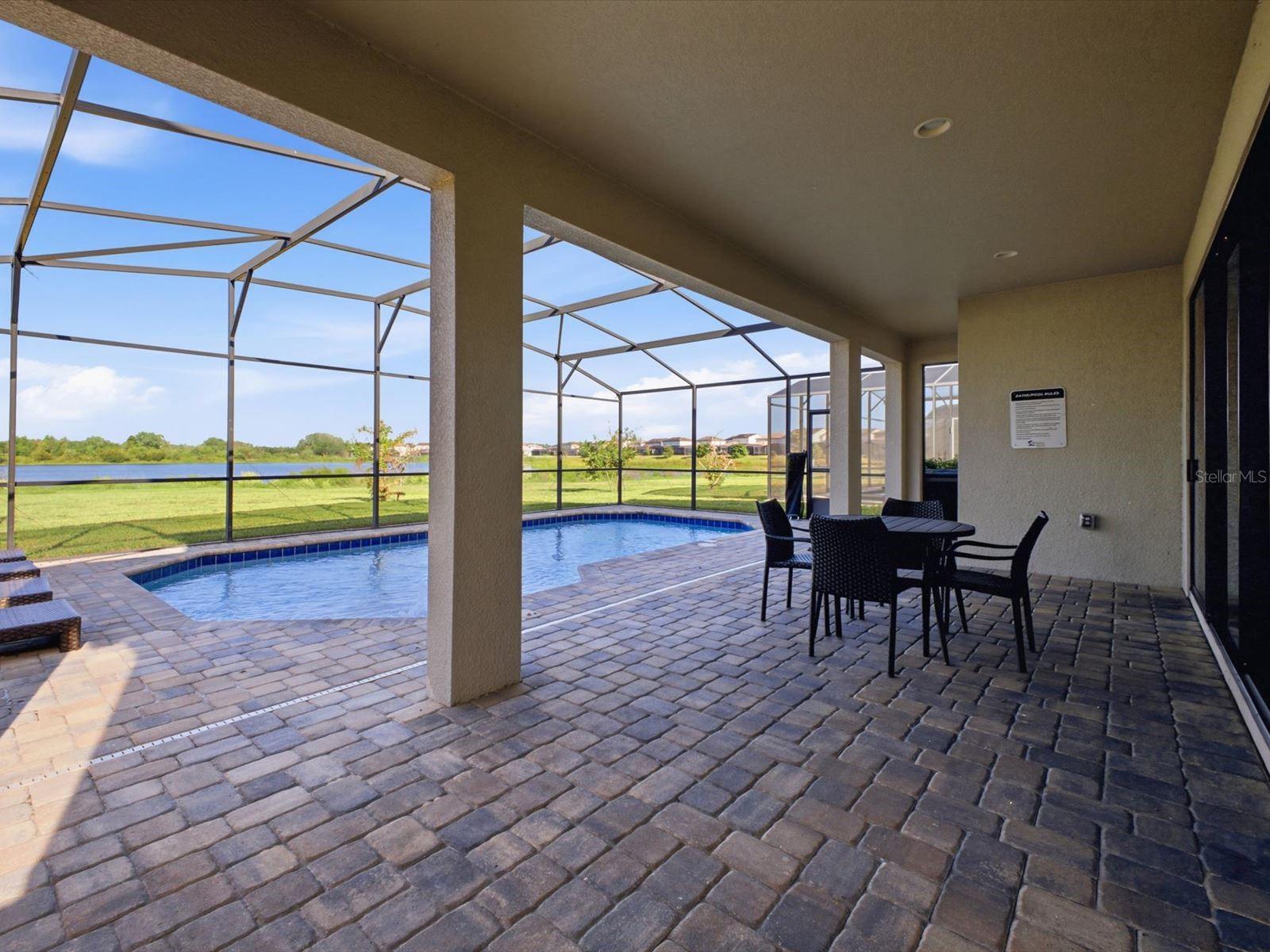 Screened in west facing pool with water view