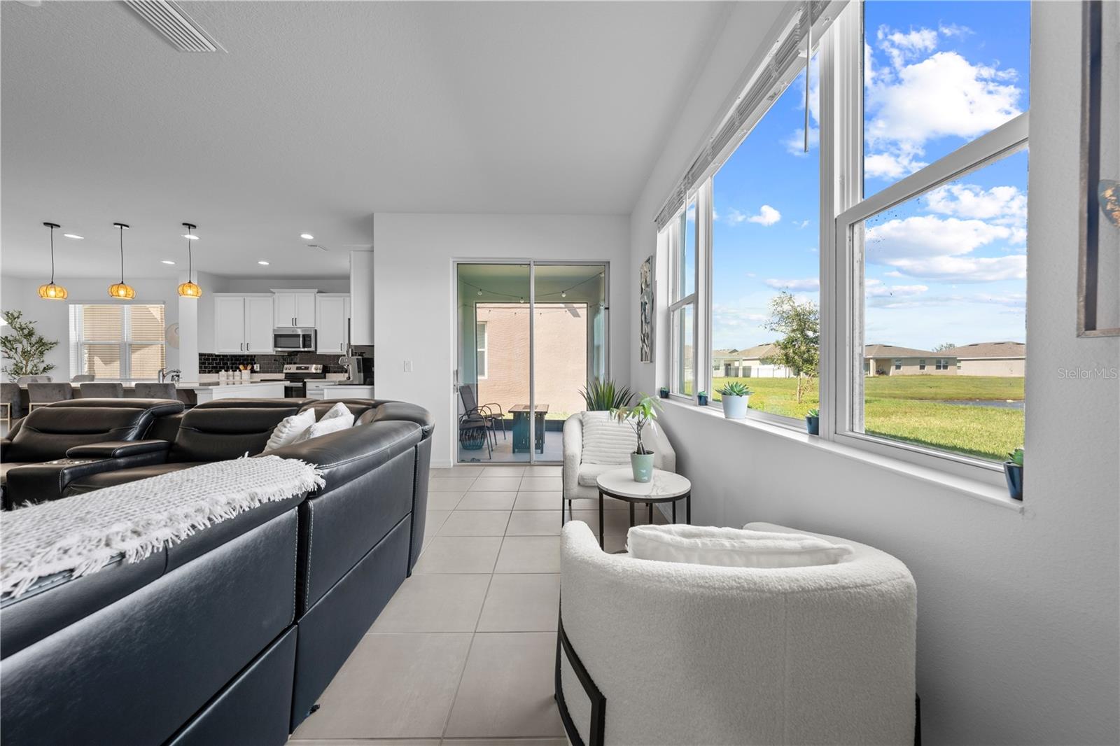 View from hallway to family room, kitchen and lanai
