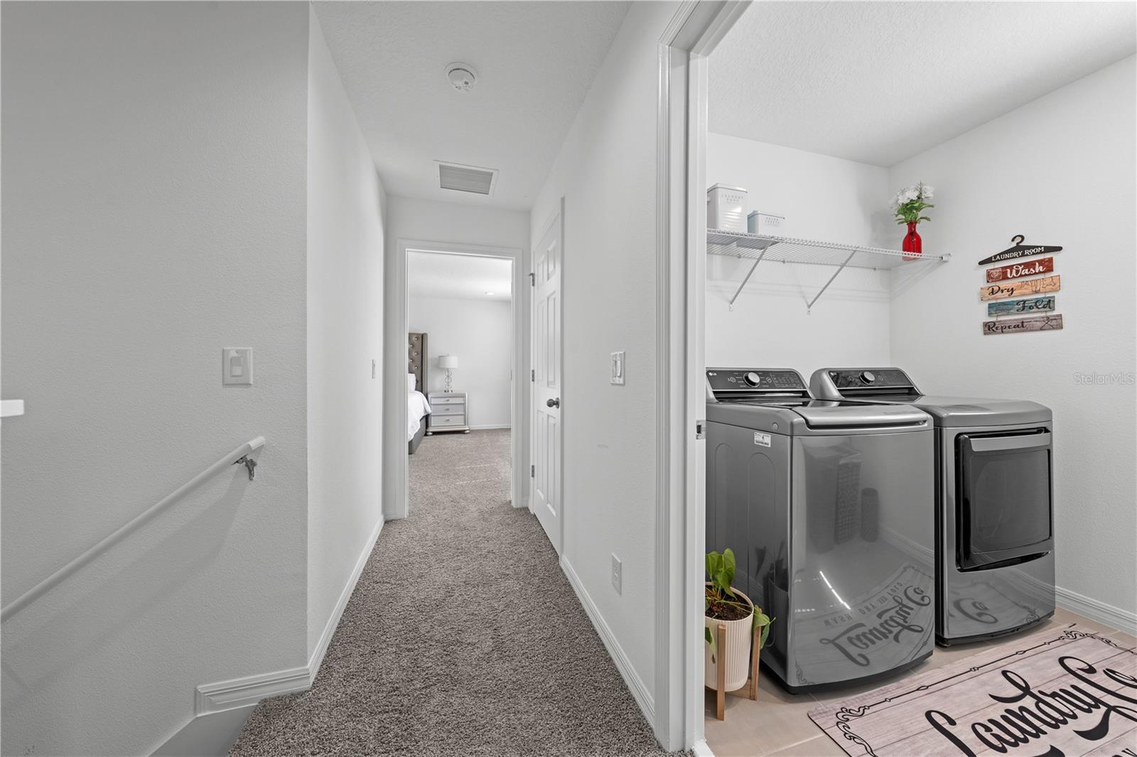 Hall to master and laundry room on the right