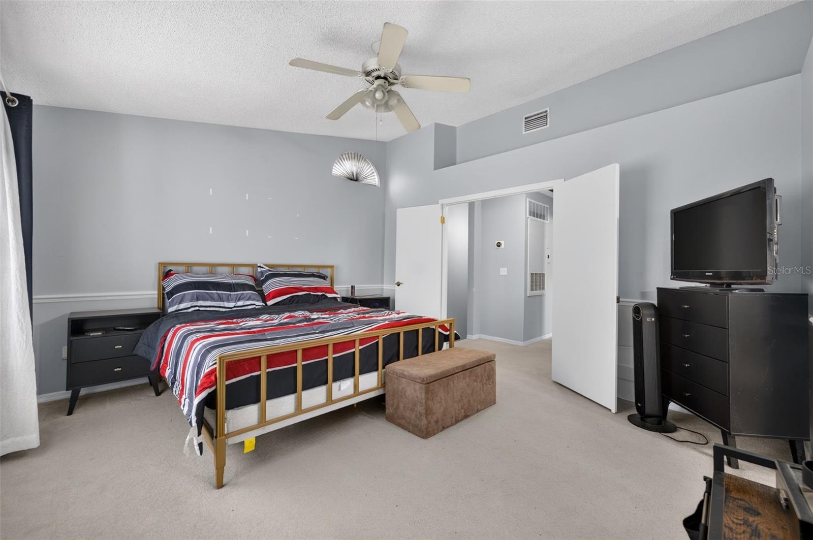 Spacious with double doors and a walk-in closet.