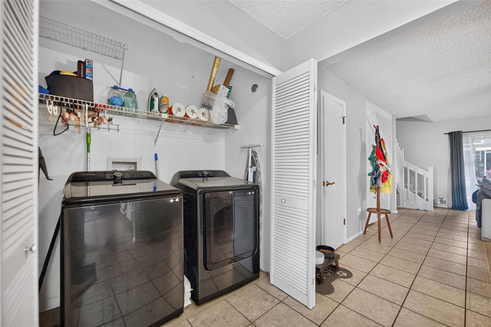 Downstairs laundry closet, so convenient!