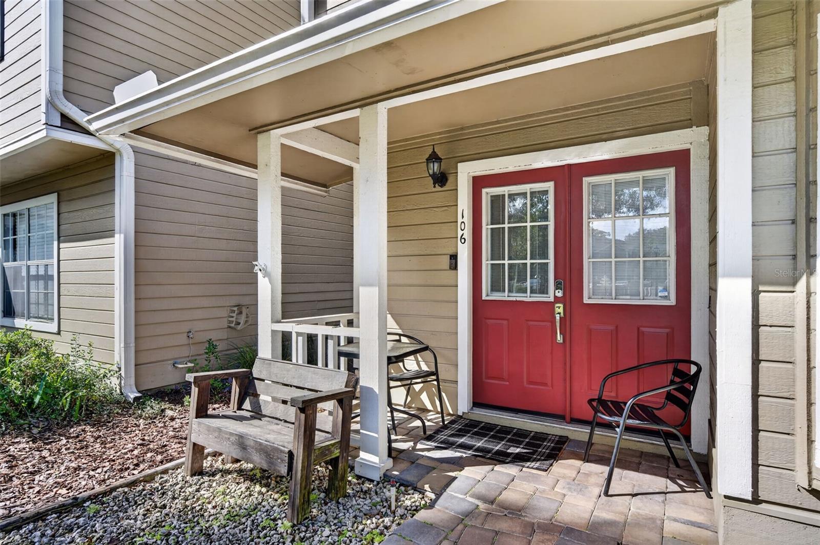 Enjoy time on your front porch looking out onto the courtyard. Enjoy time on your front porch looking out onto the courtyard.