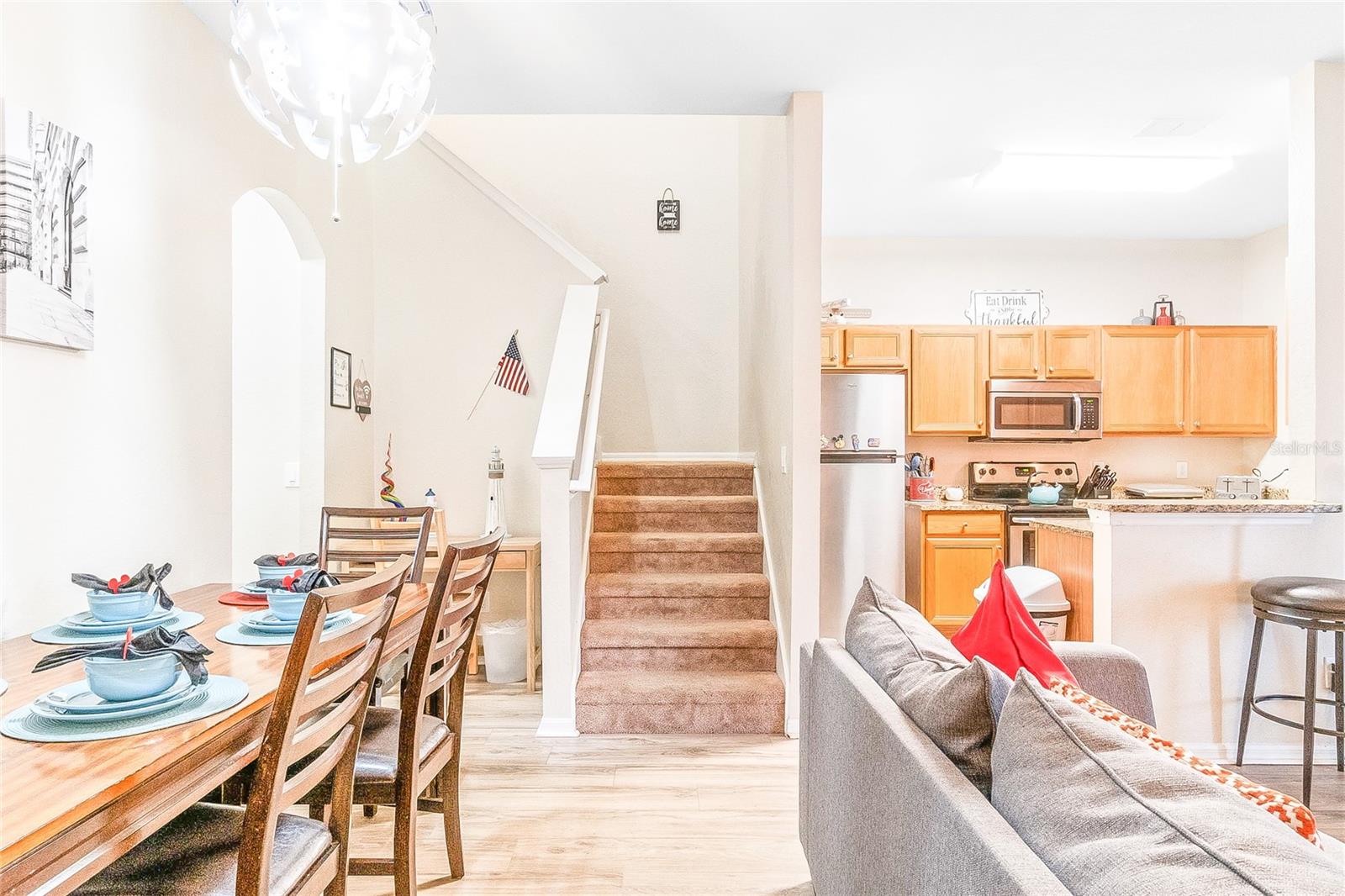 Dining area, kitchen and staircase