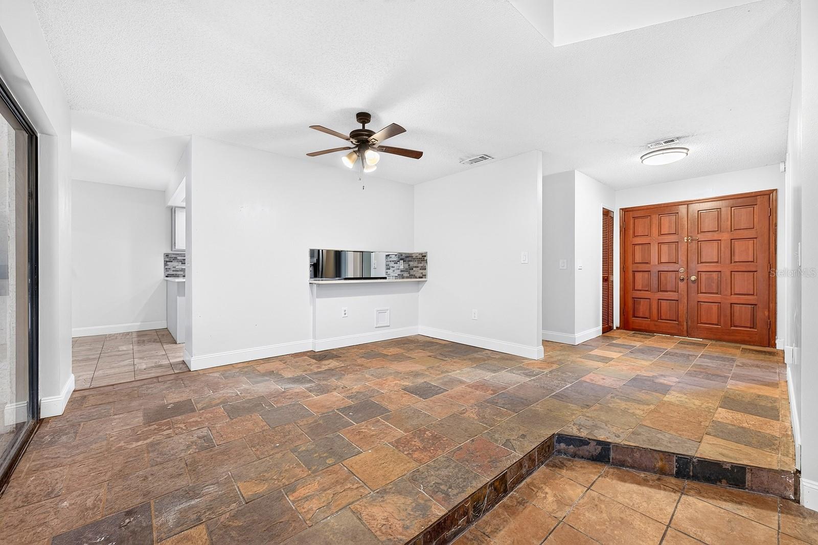 Foyer, dining area.