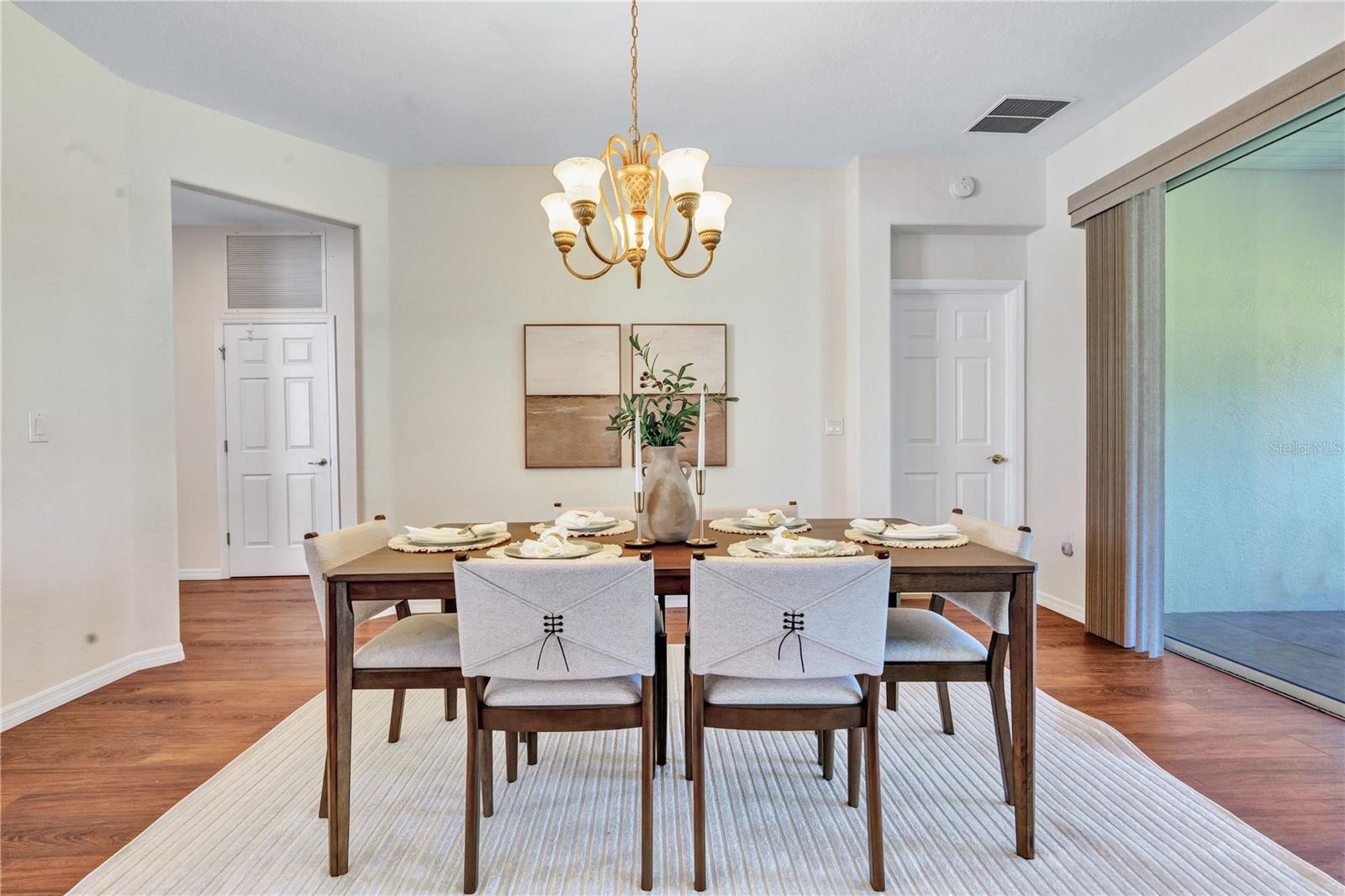 Bright formal dining space complements the Granville model's open, single-level floor plan.