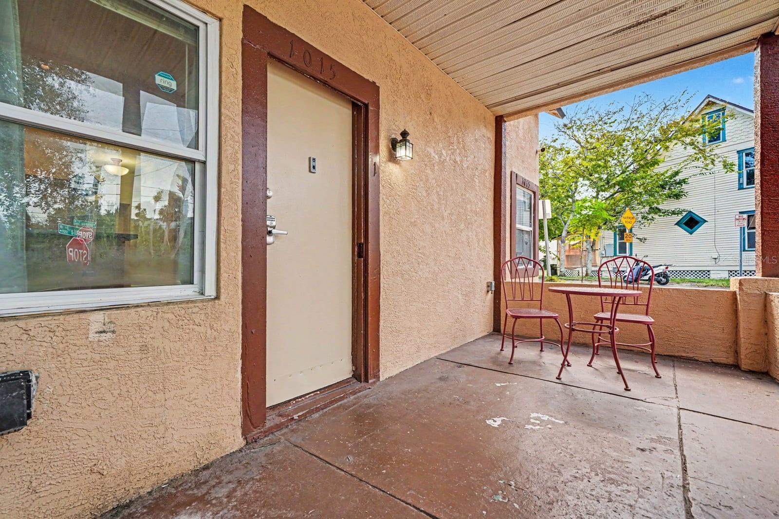Front Porch Seating Area With Covered Overhang & Windows Front Porch Seating Area With Covered Overhang & Windows