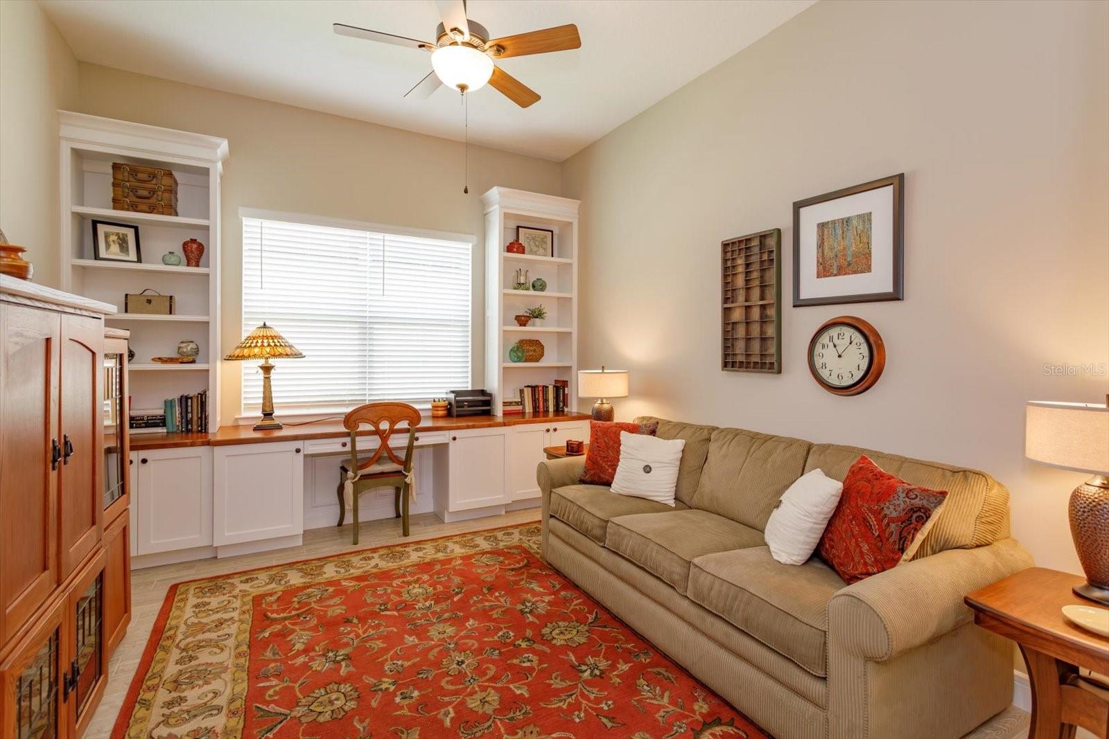 Flex/Den/Office with Custom Cabinets, Shelving and Desk