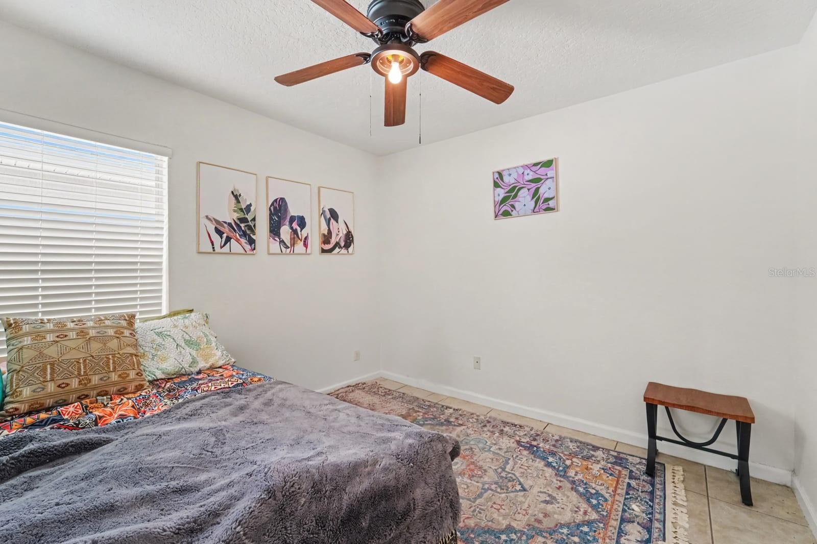 Master Bedroom Suite with Double Closets, Ensuite Access & Ceiling Fan