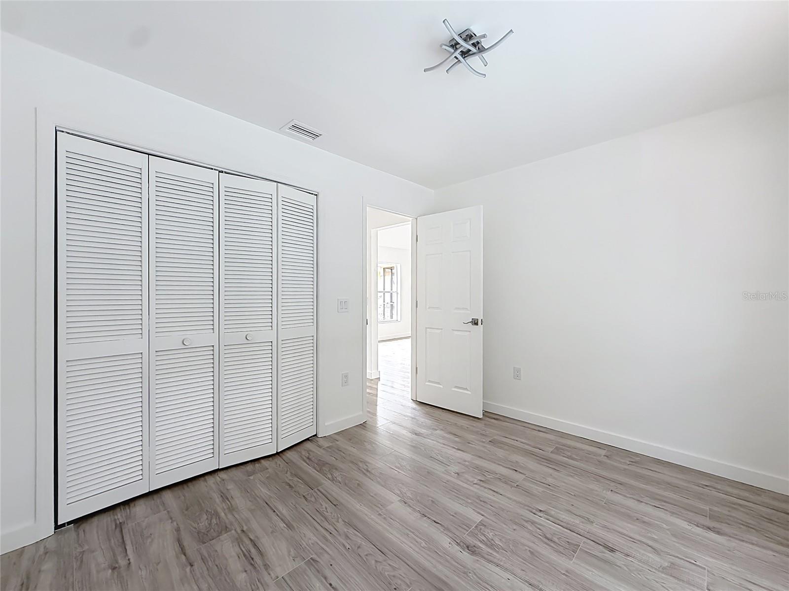 Generous closet space keeps your bedroom organized.