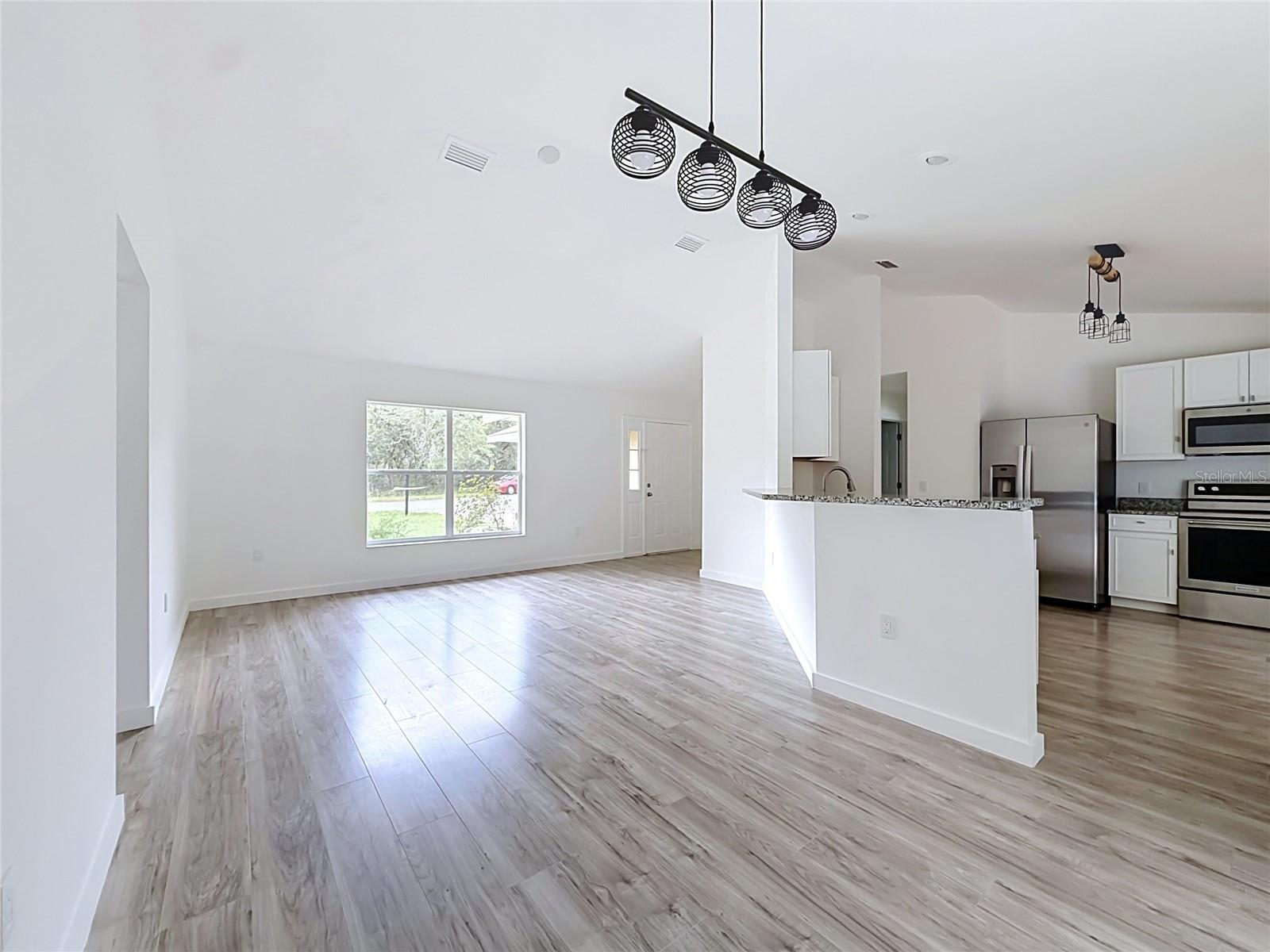 An open layout keeps guests and conversation connected.