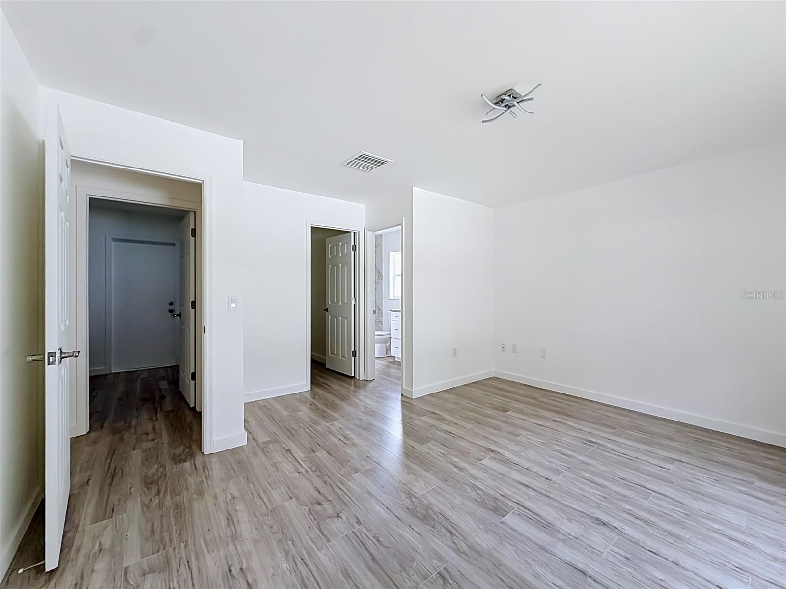 A spacious primary suite for restful evenings.