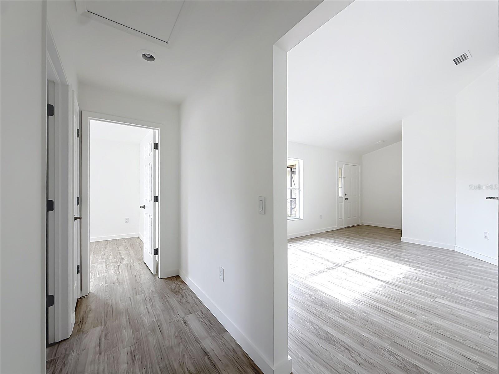 A flowing layout links living spaces and outdoor access.